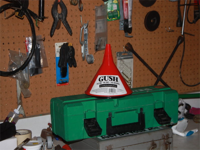 Gush funnel sitting on top of a toolbox in workshop